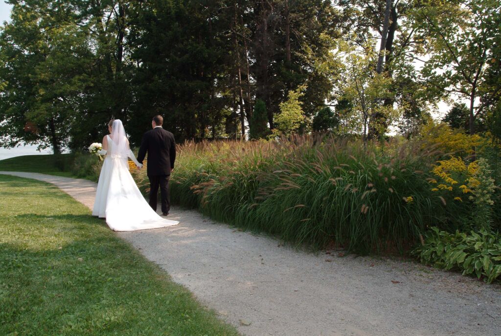 Golden Hour romantic Bride and Groom walking in park | Toronto Wedding Photographer | Maya Kovacheva