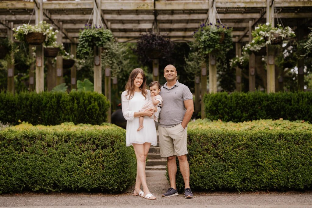 Young Family portrait in a park.