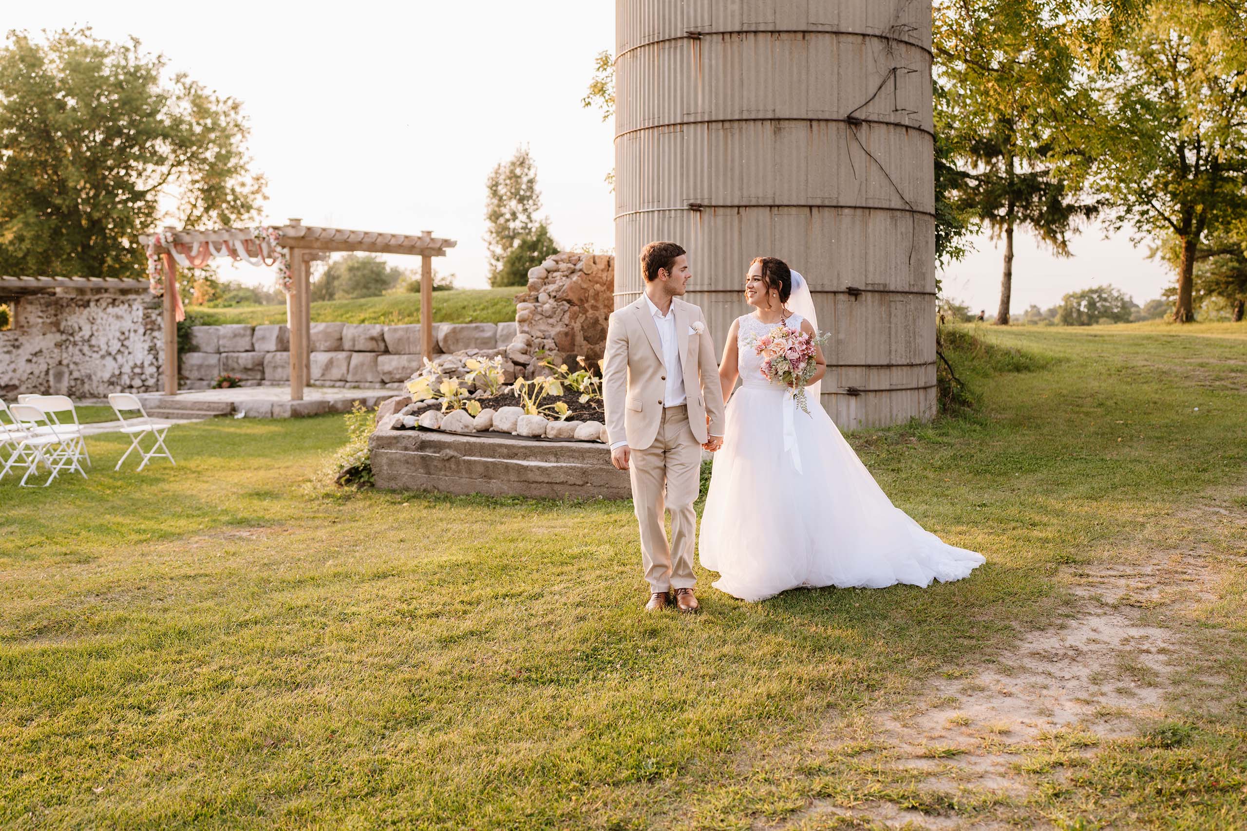 Bride and groom sharing a quiet moment during golden hour portraits in Toronto.